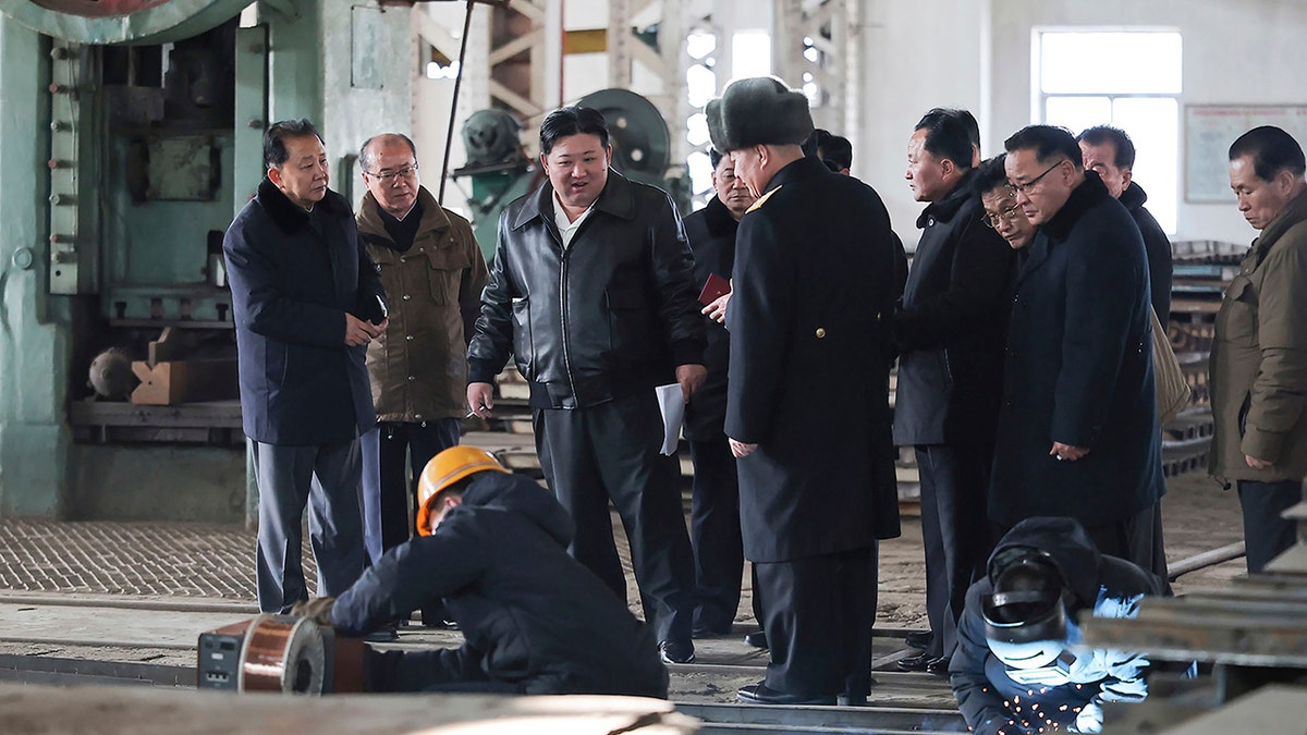 Kim, officials at the shipyard