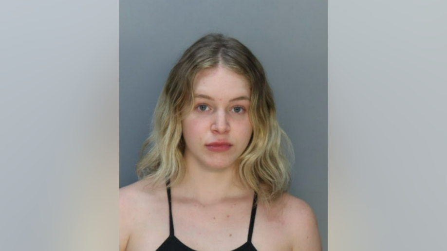 Courtney Clenney appears in a Miami-Dade County booking photo