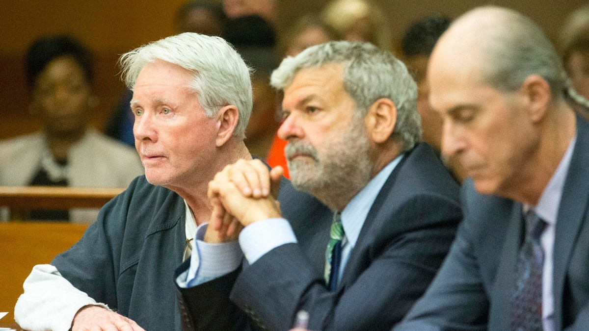 Claud "Tex" McIver, left, sits with his attorneys, Don Samuel, center, and Bruce Harvey, right, after being sentenced to life in prison with the possibility of parole in front of Fulton County Chief Judge Robert McBurney at the Fulton County courthouse in Atlanta, Wednesday, May 23, 2018.