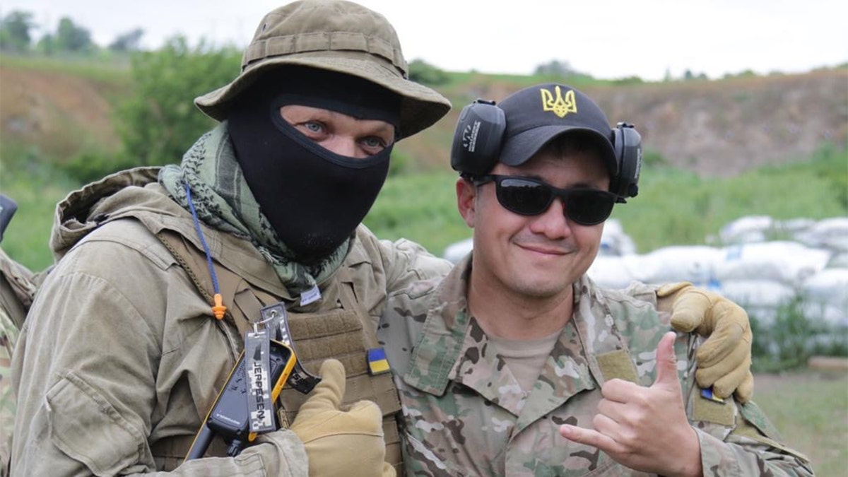 John Roberts with Ukrainian soldier