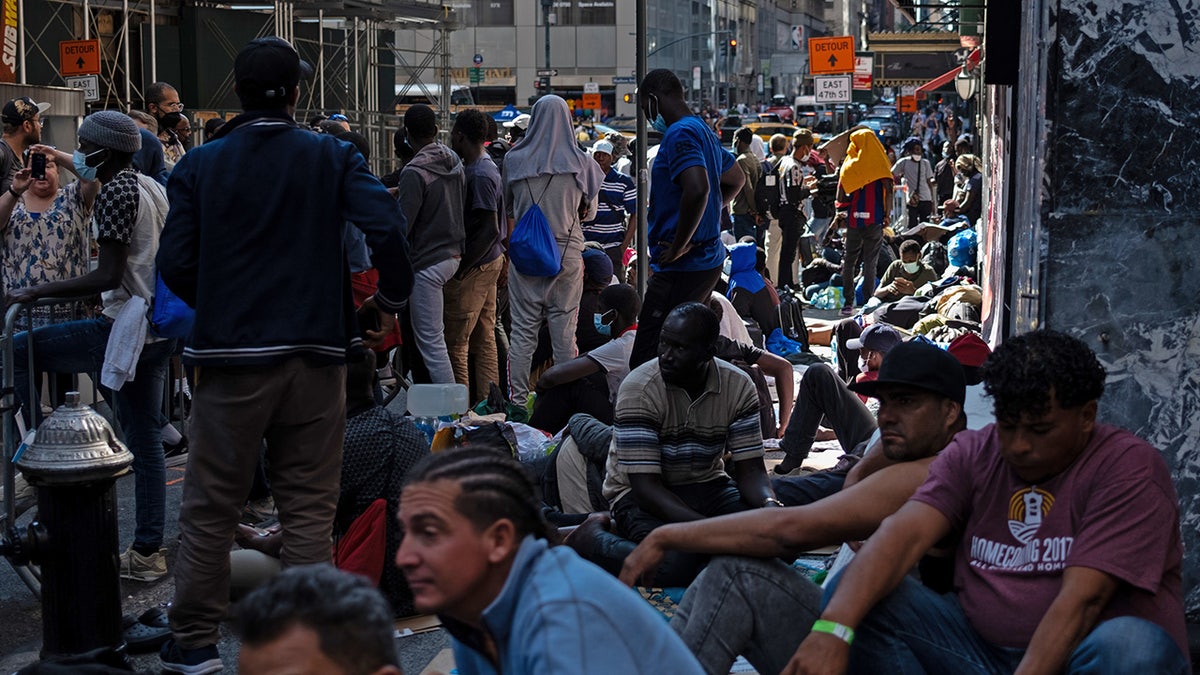 Migrants outside Roosevelt Hotel