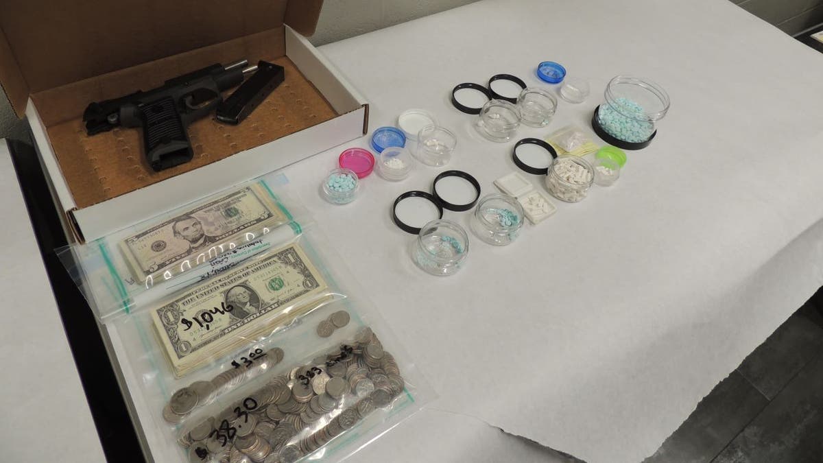 Spread of weapons, cash seized from drug bust