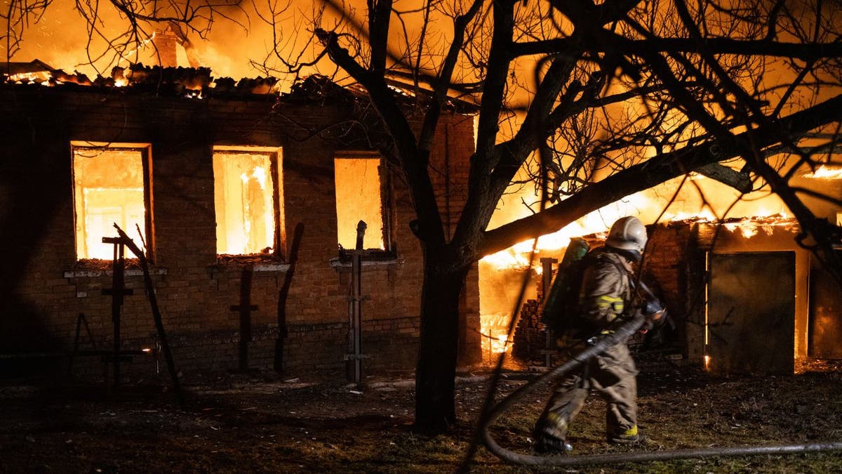 Firefighter putting out a blaze in Ukraine