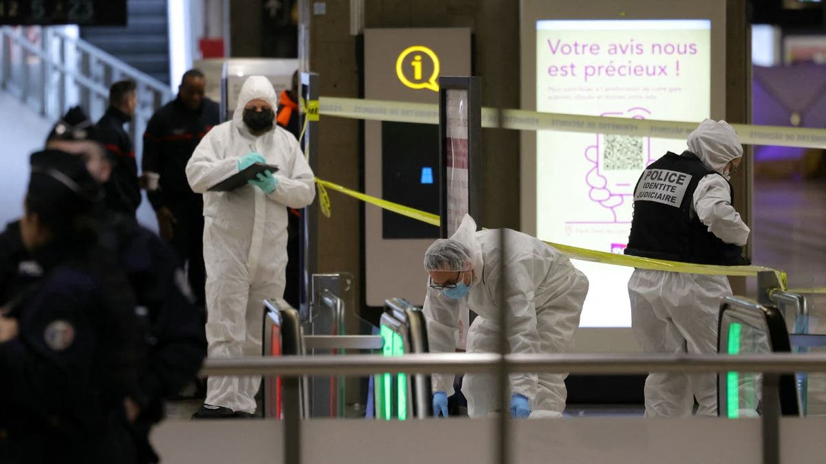 French forensic and judicial police collect evidence after a knife attack