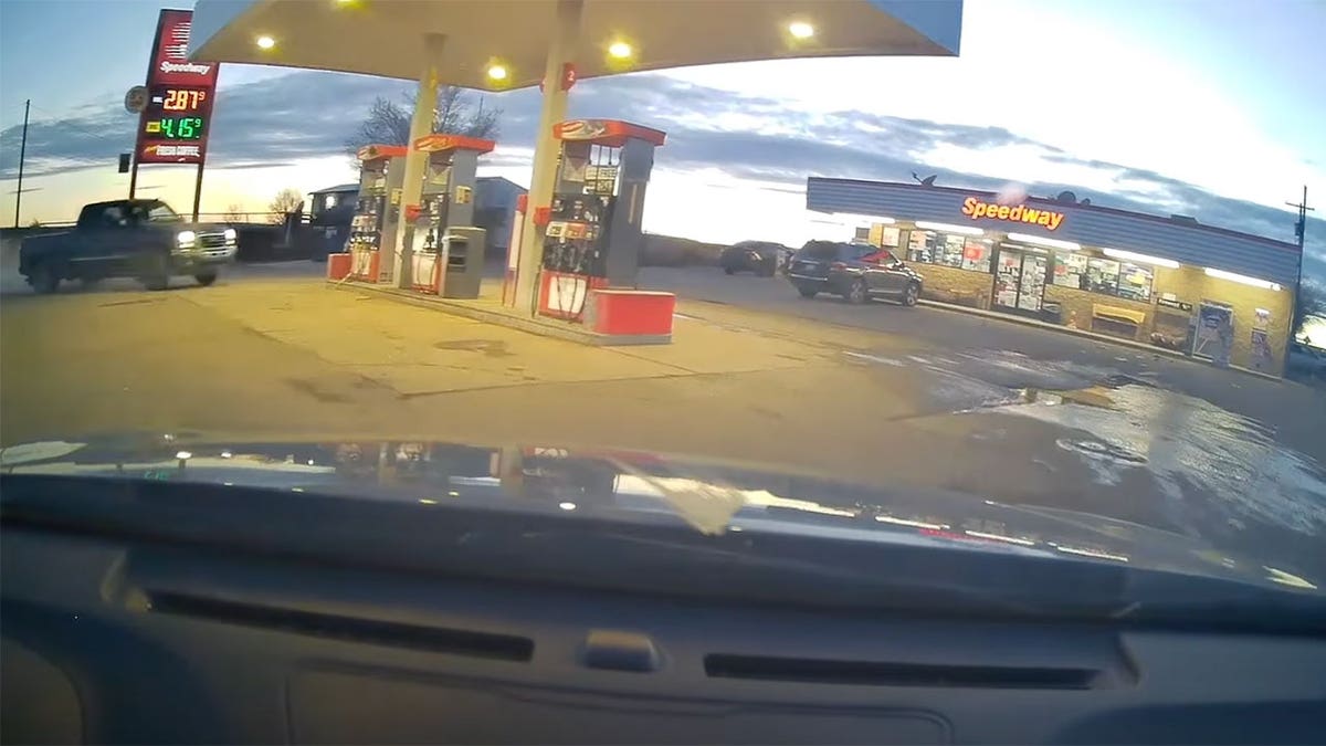 Truck heads towards gas pumps