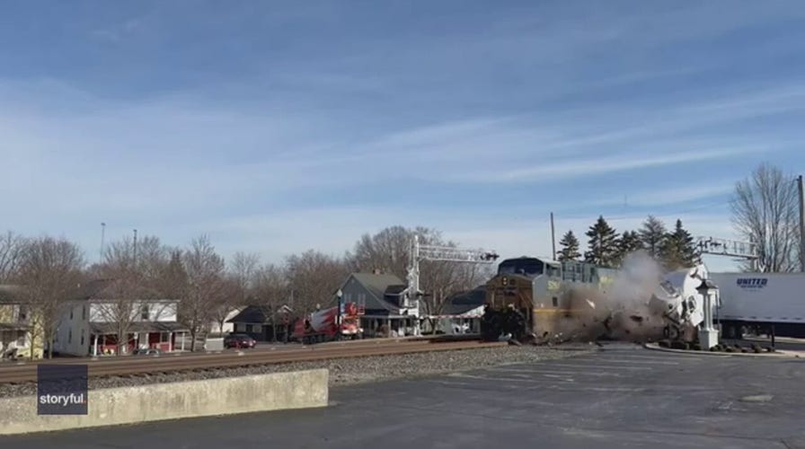 Ohio driver escapes moments before train slams into truck
