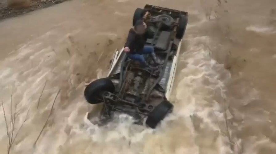 California woman stranded on top of overturned car in flooded waters for 15 hours 