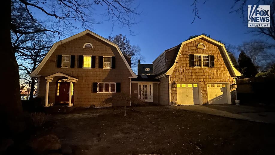 An exterior view of the front entrance of Joseph and Susana Landa’s home where squatter Brett Flores has taken over.