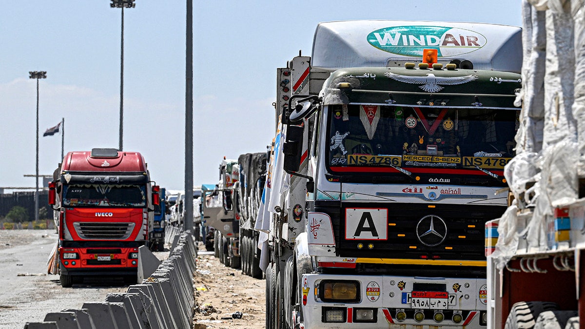Aid trucks wait to enter Gaza