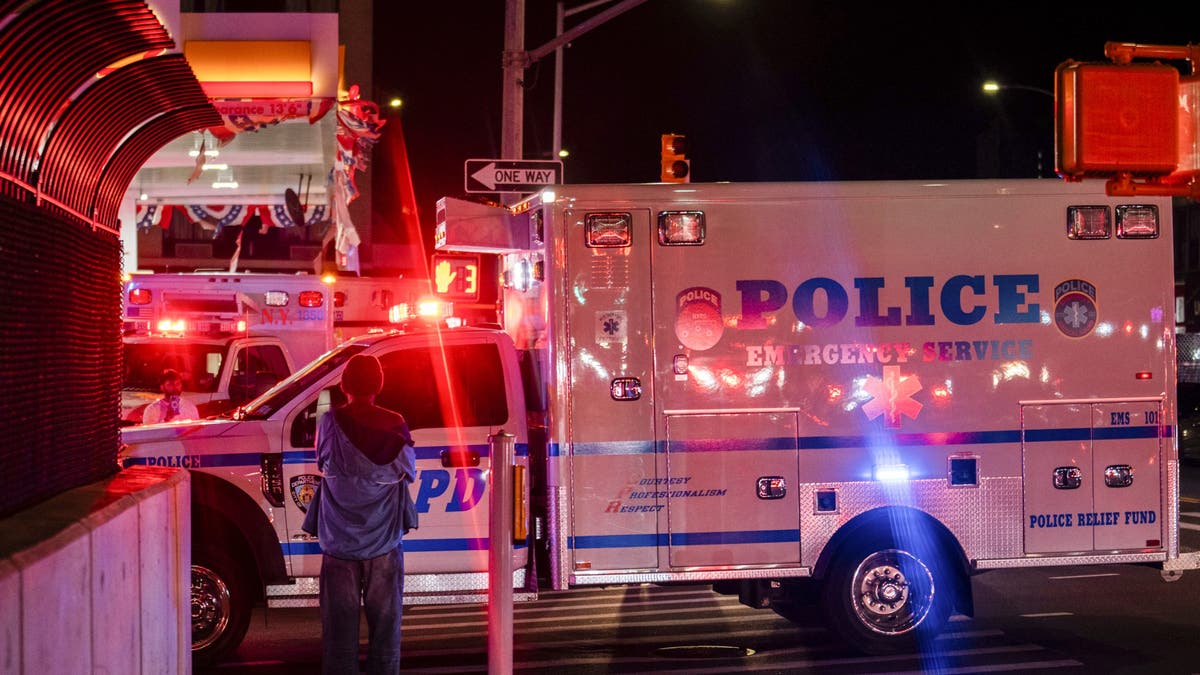 Ambulance transports NYPD Officer Killed in Action, Jonathan Diller
