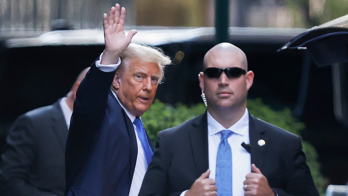 Former president Donald Trump leaves Trump Tower on his way to Manhattan criminal court