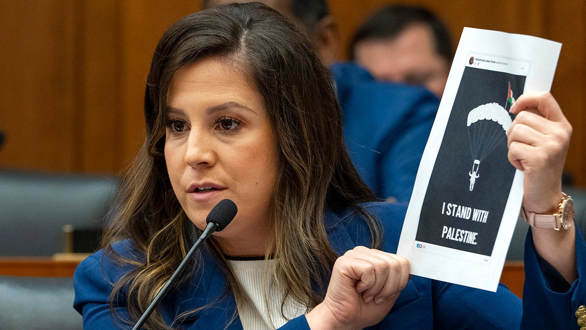 Stefanik holds up photo of Hamas paraglider posted by NYC teacher