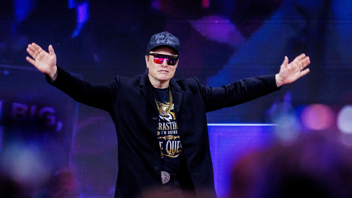 Musk with arms stretched out