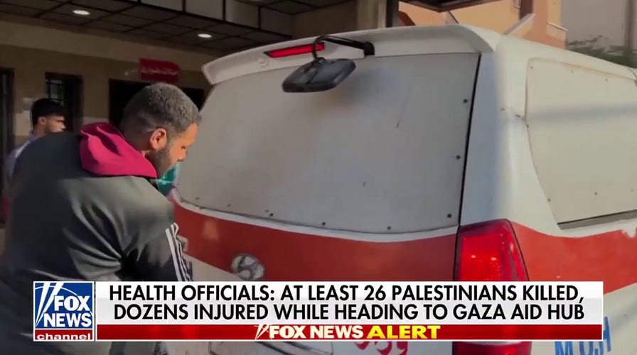Dozens killed, scores injured while heading to Gaza aid hub, health officials say