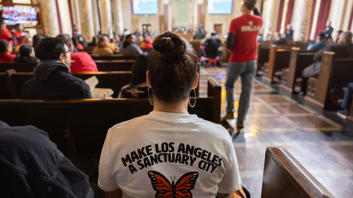 LOS ANGELES, CA - DECEMBER 04: Supporters came out for the city's downtown development plan at City Hall in Los Angeles, CA on Wednesday, Dec. 4, 2024 as well as for the city's ordinance as a sanctuary city saying that 20,000 garment workers are immigrants who could be affected by President-elect Donald J. Trump's deportations. (Myung J. Chun / Los Angeles Times via Getty Images)