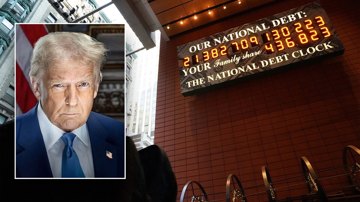 Trump next to national debt clock