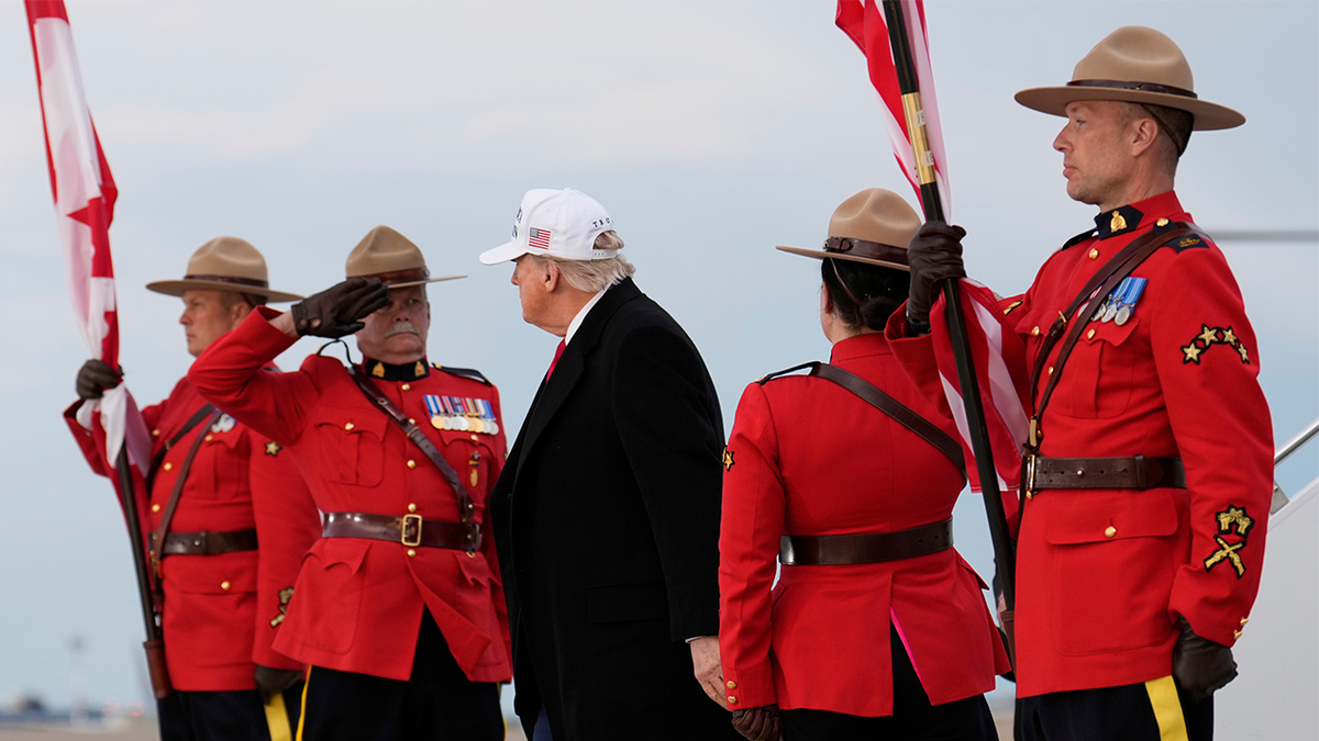 U.S. President Donald Trump arrives on Air Force One at Calgary International Airport