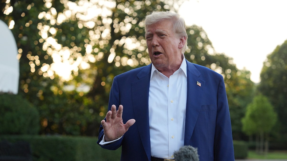 Trump speaks with reporters