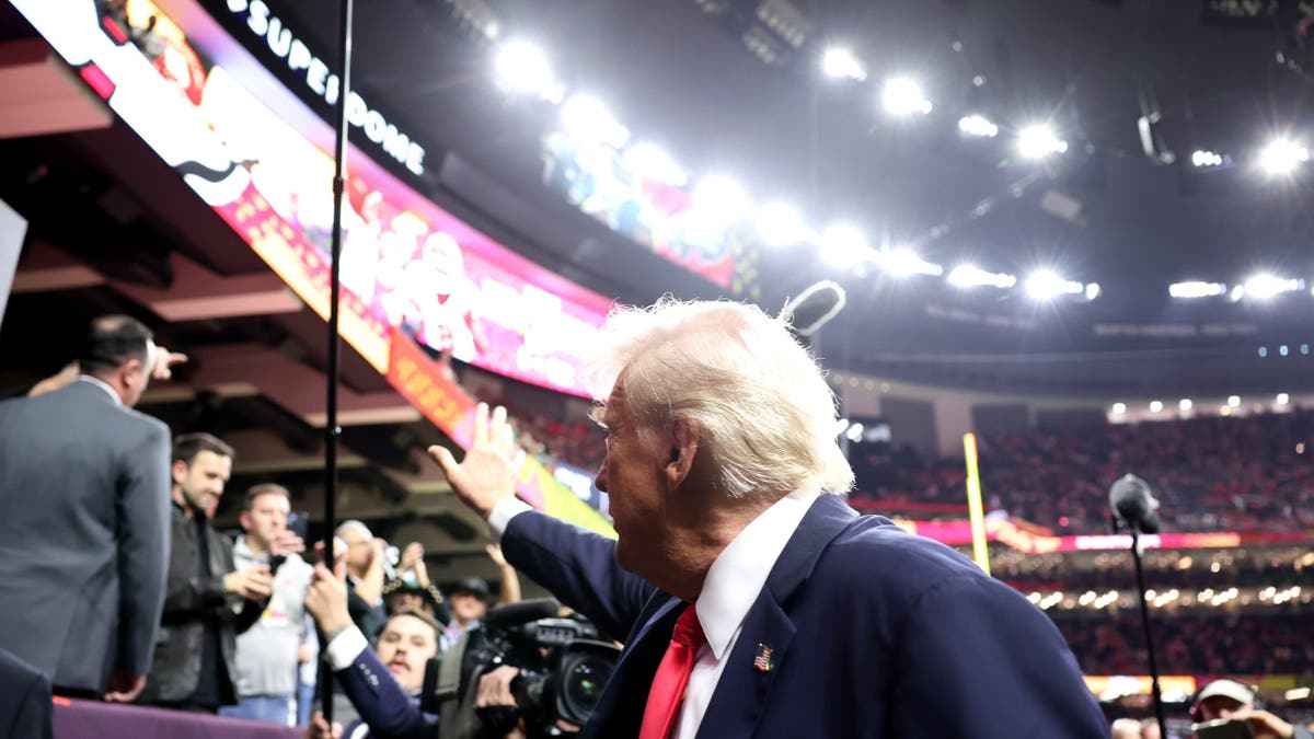 Trump at Super Bowl, waving