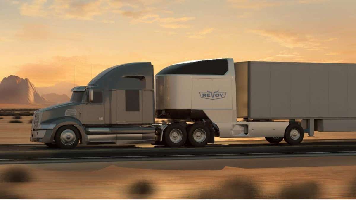 A big rig using a high-tech electric dolly with its own motor and a battery pack.