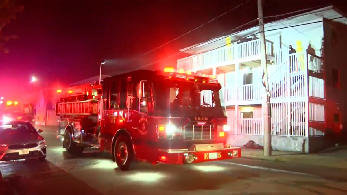 Fire truck outside multi-level building