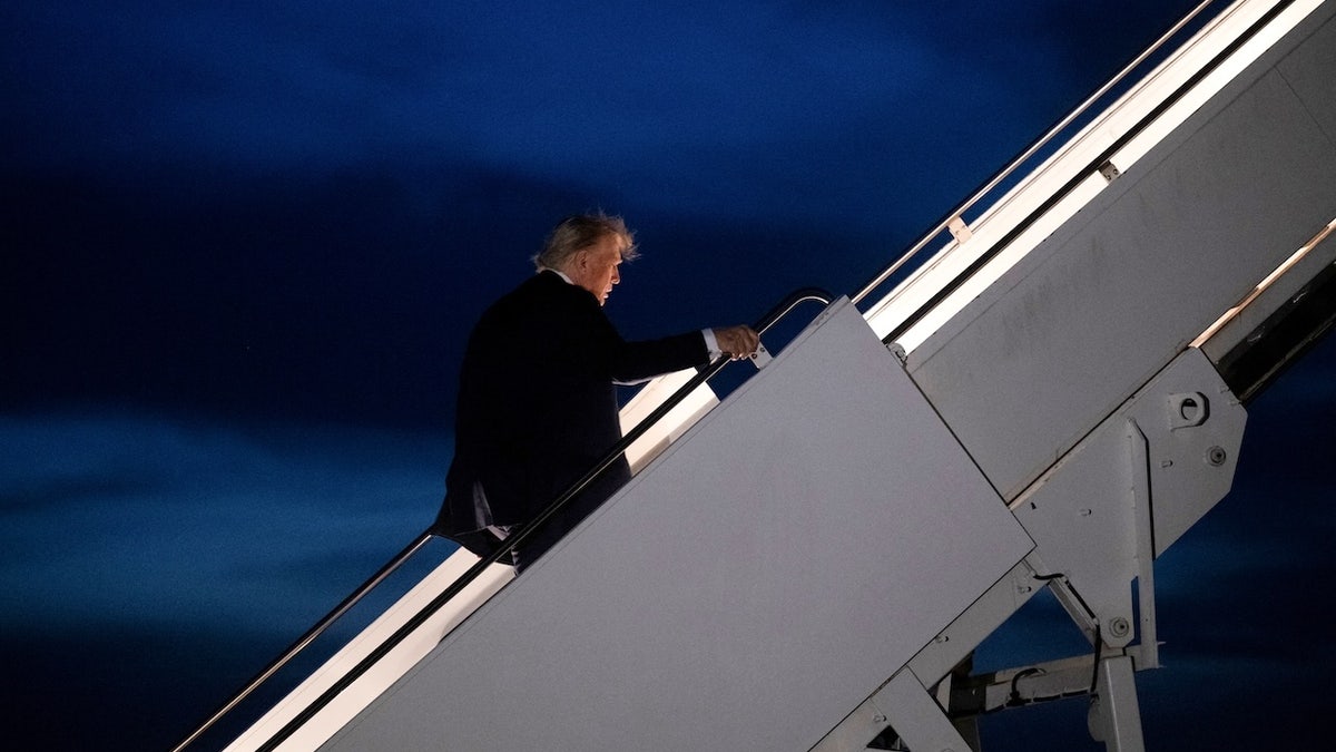 US President Donald Trump boards Air Force One at Calgary International Airport in Alberta, Canada, on June 16, 2025, after attending the Group of Seven (G7) Summit. US President Donald Trump left a G7 summit in Canada a day early on June 16, heading back to the White House as Israel and Iran traded missile fire for a fifth straight day.  