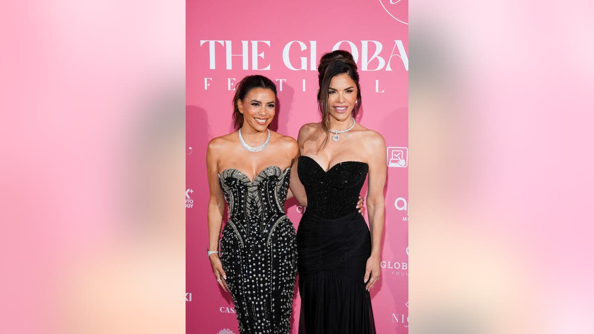 Lauren Sanchez and Eva Longoria wear black dresses at event
