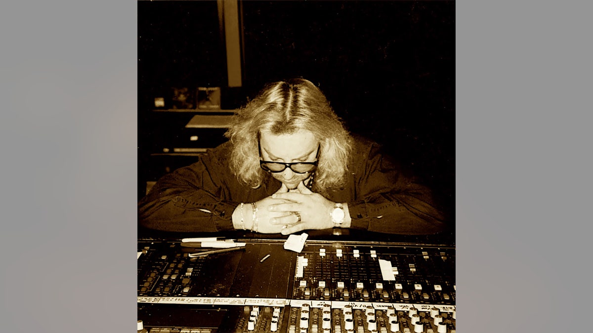 Alan Niven looking down at the recording studio.