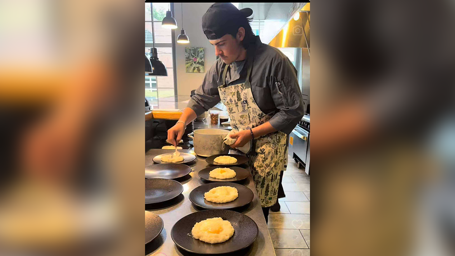 Aiden Sloan working in restaurant 