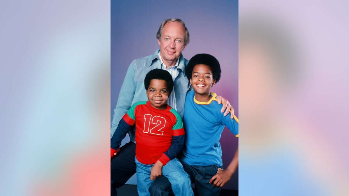 Gary Coleman as a child posing with his "Diff'rent Strokes" co-stars.