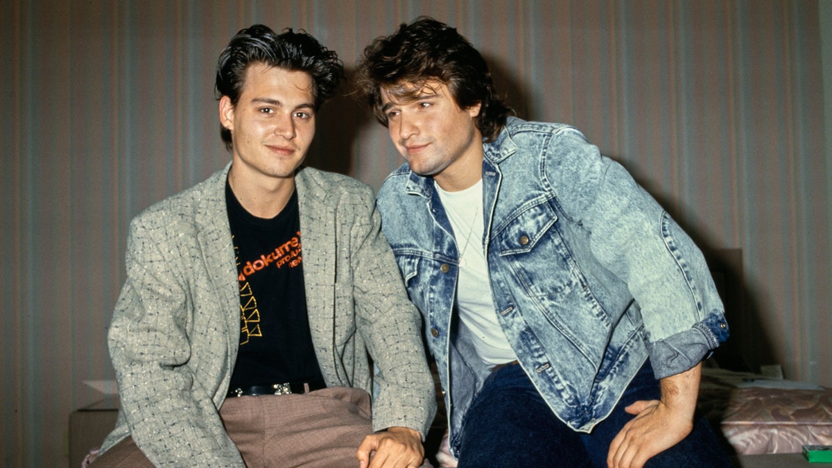 Johnny Depp and Peter DeLuise attend an event