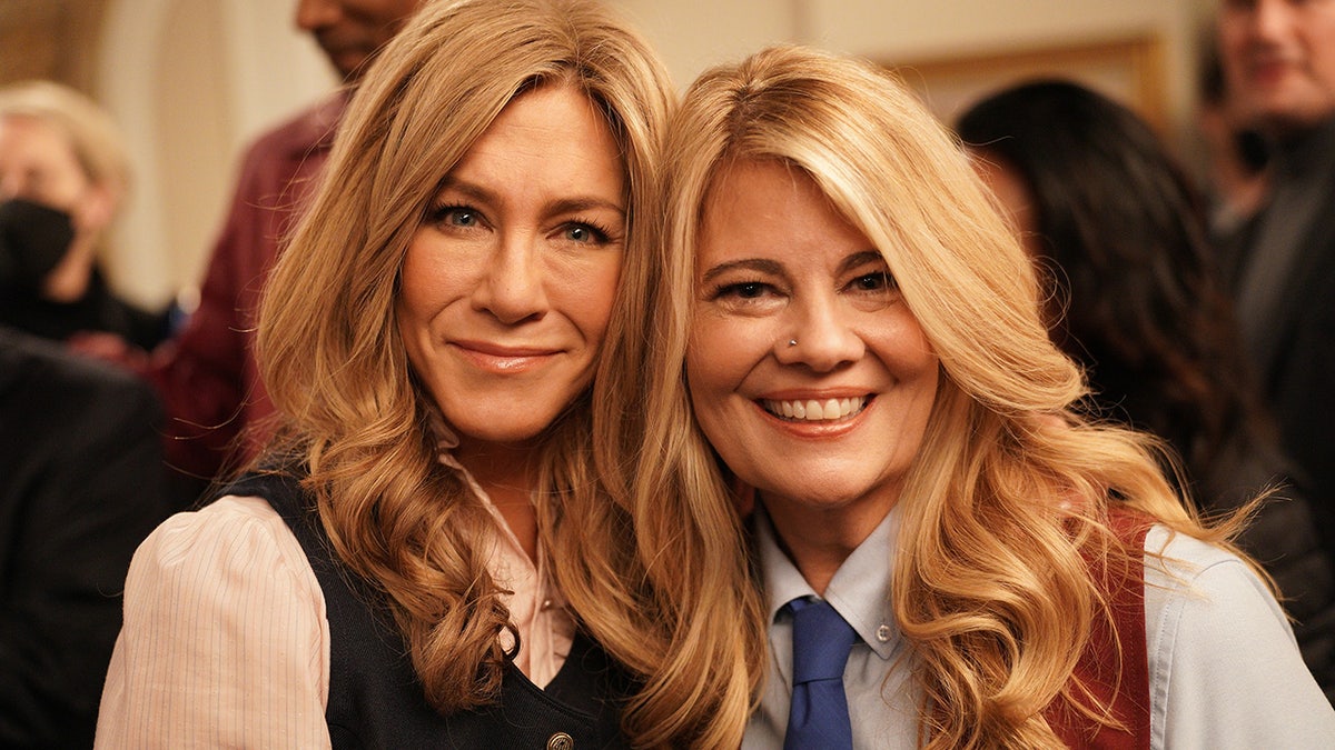 Jennifer Aniston Lisa Whelchel sharing an embrace