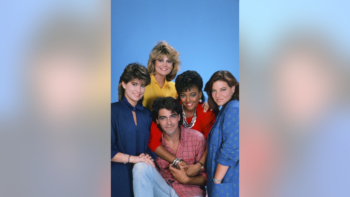 The cast of "The Facts of Life" in a warm embrace.