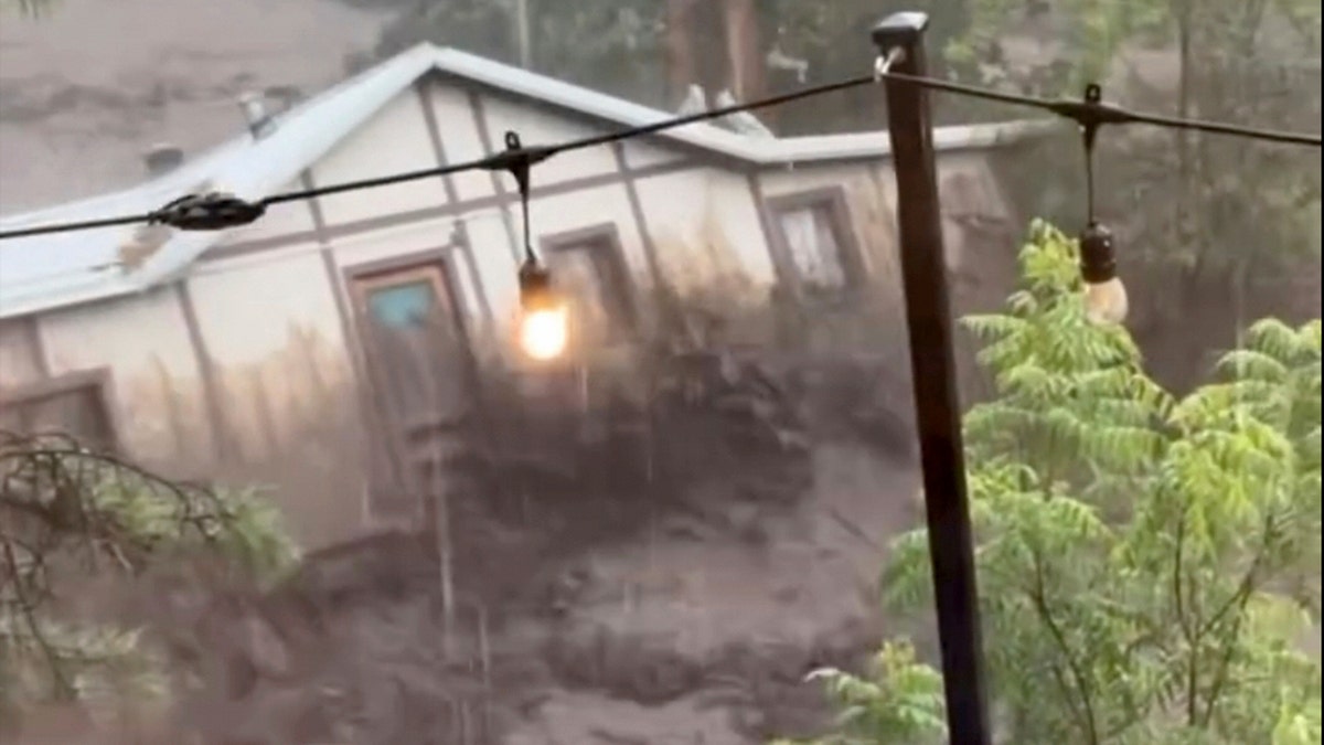 House floating down Ruidoso river