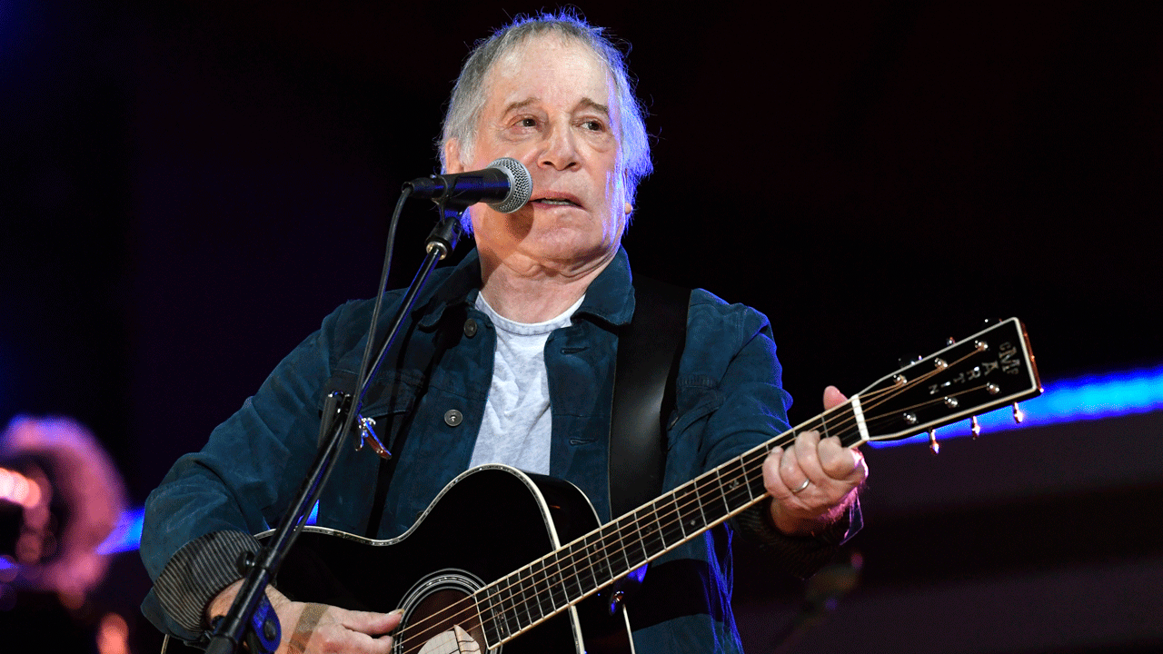 Paul Simon performing