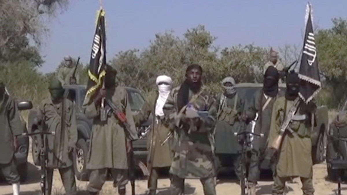 Oct. 31, 2014 - FILE photo of members of Nigeria's Islamic extremist group Boko Haram, Islamic extremists from Nigeria attacked a border town inside Niger, marking the 2nd foreign country attacked by the group in several days.  