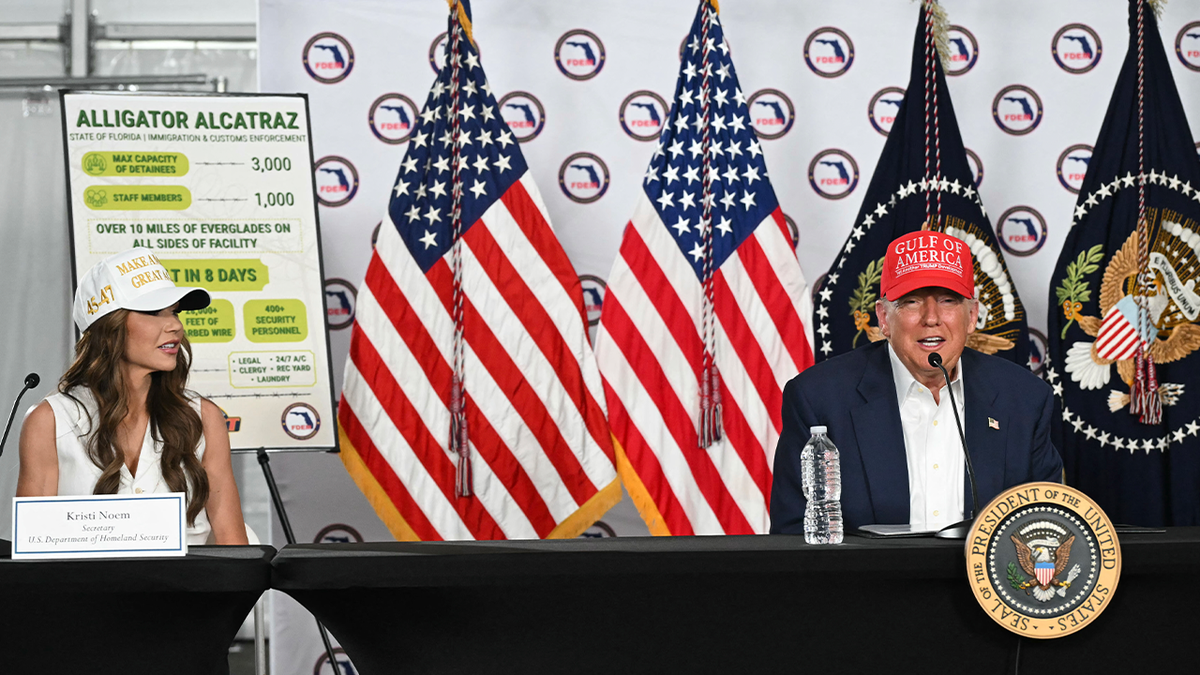Trump and Noem speak during meeting
