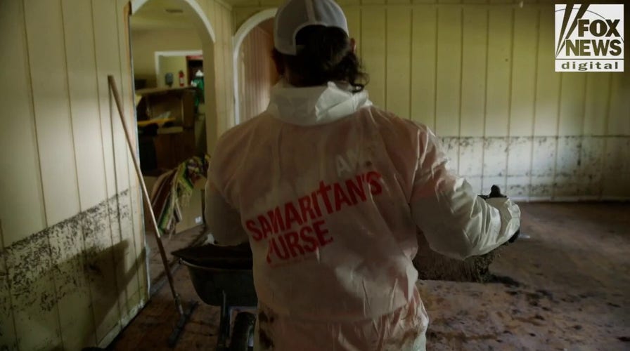 Samaritan's Purse volunteers bring faith to tragedy while helping clear out flood damage