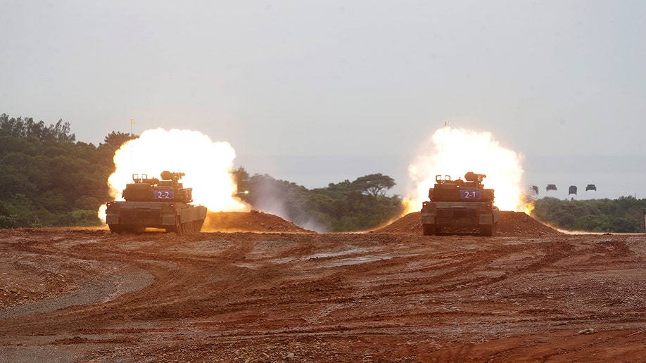 M1A2T Abrams main battle tanks fire