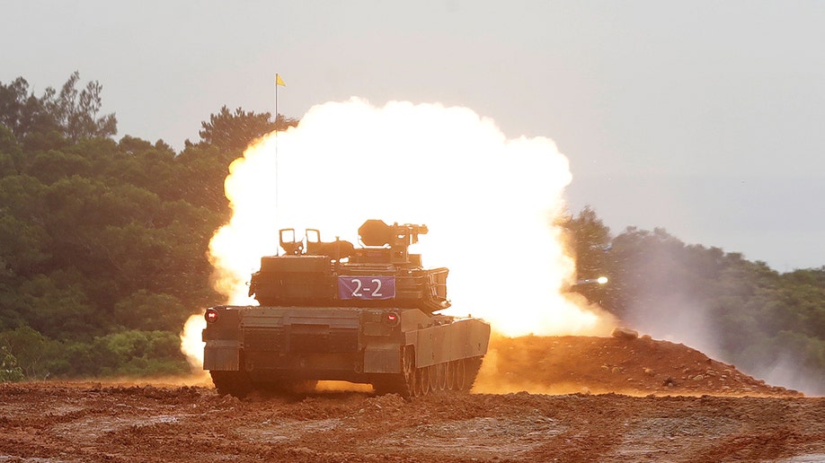 A M1A2T Abrams main battle tank fire