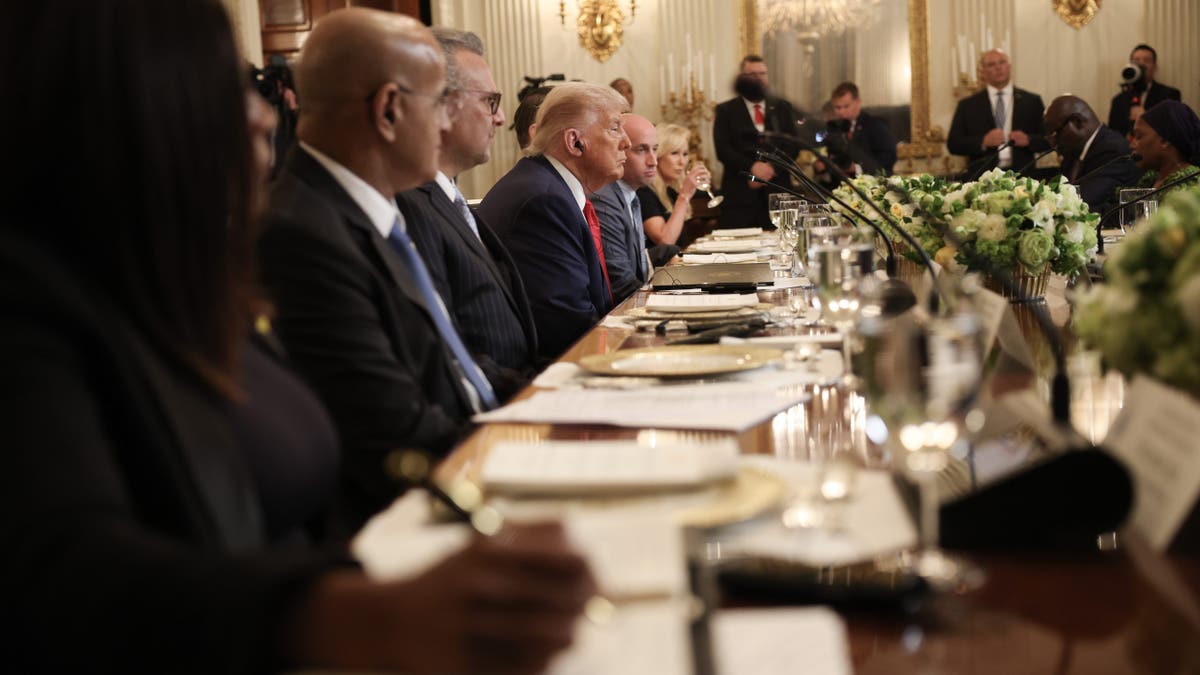 President Donald Trump listens during a multilateral lunch with African leaders in the State Dining Room of the White House July 9, 2025, in Washington. 