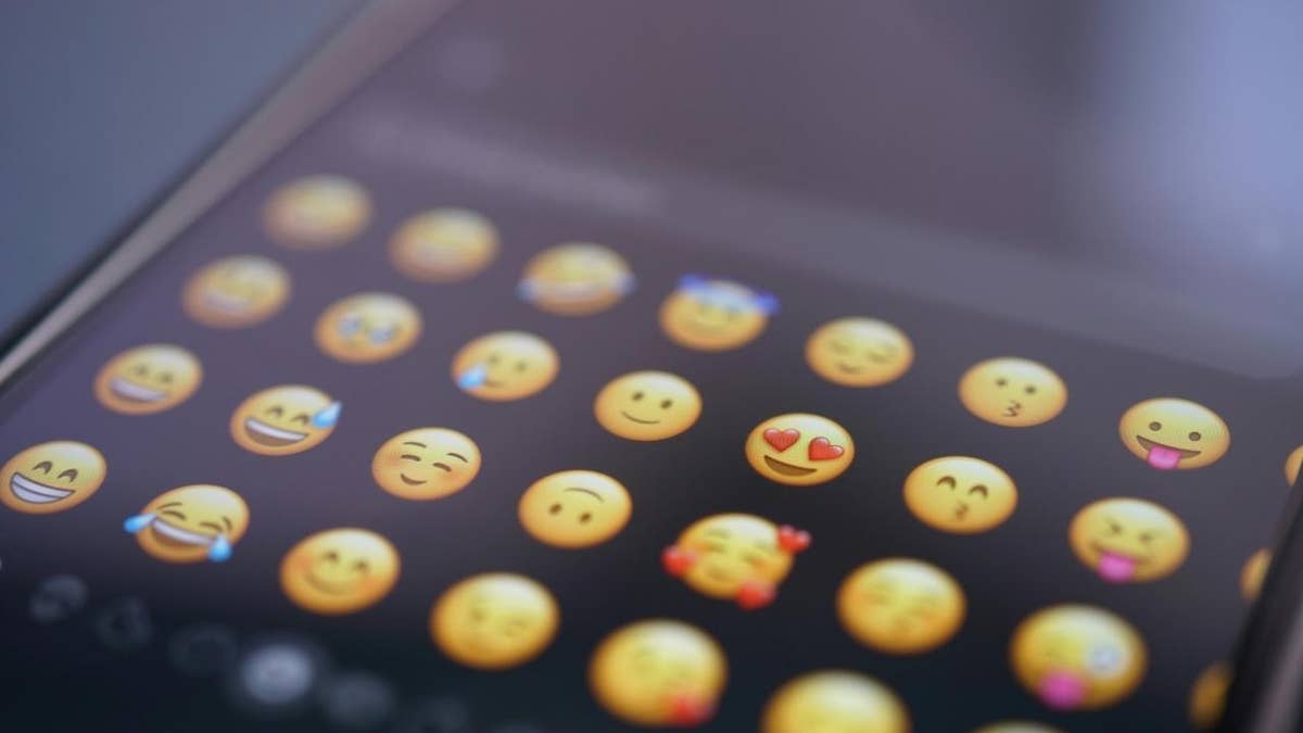 Illustration of Emojis on a smartphone.
