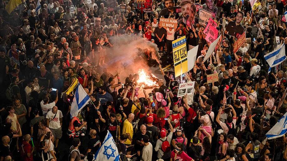 families if Israeli hostages held by Hamas gather to protest