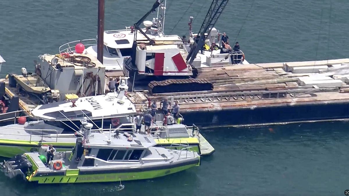 rescue boats around barge
