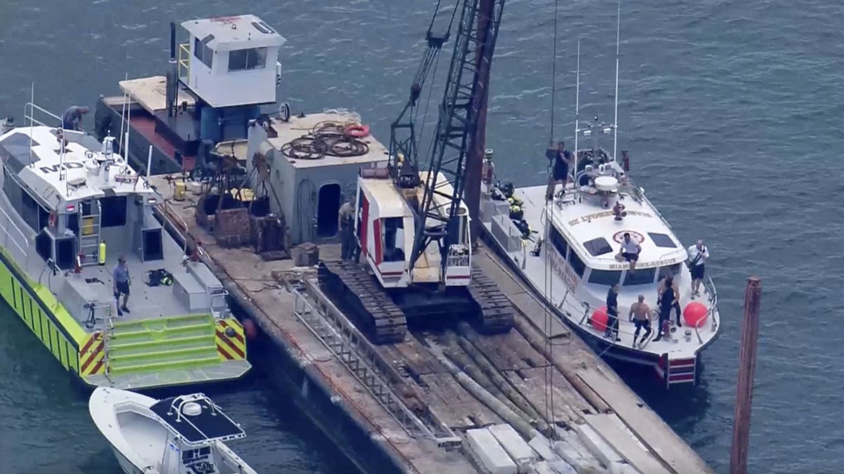 rescue boats around barge