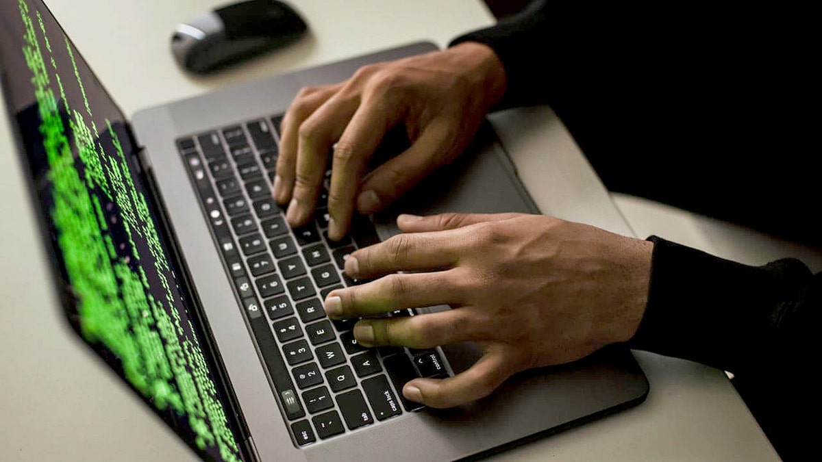 Person working on a laptop