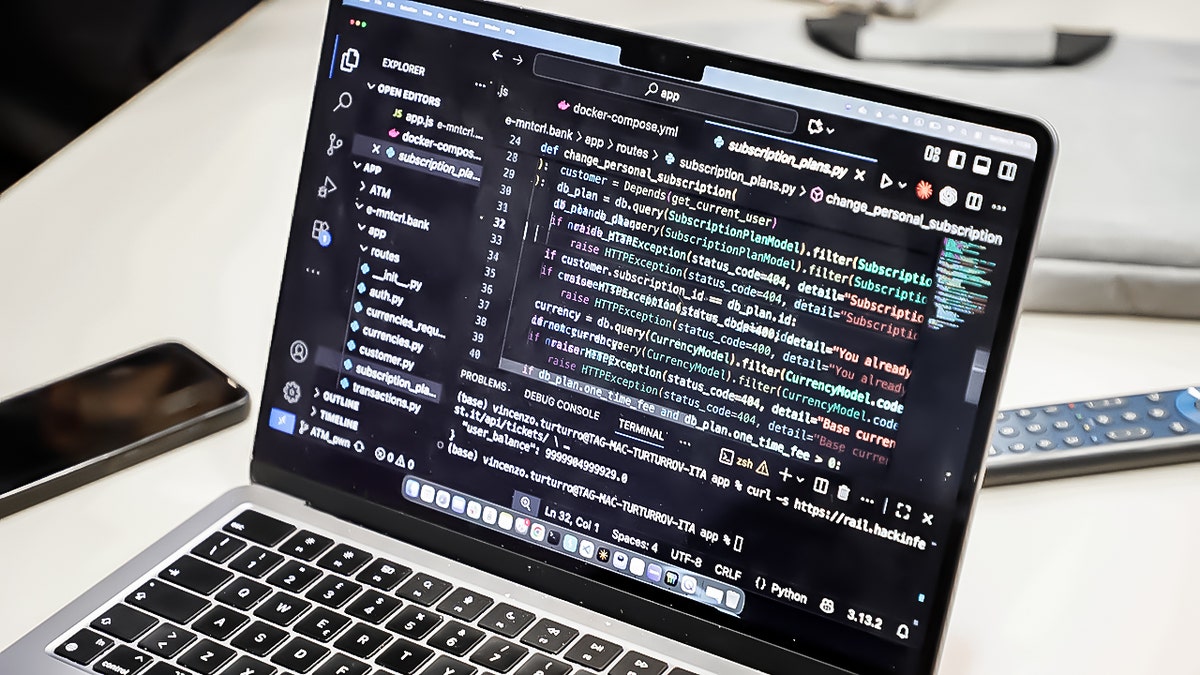 Laptop with code on the screen.