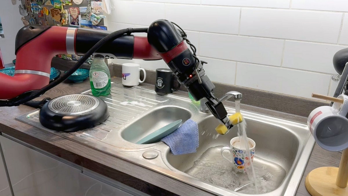 A robot doing dishes