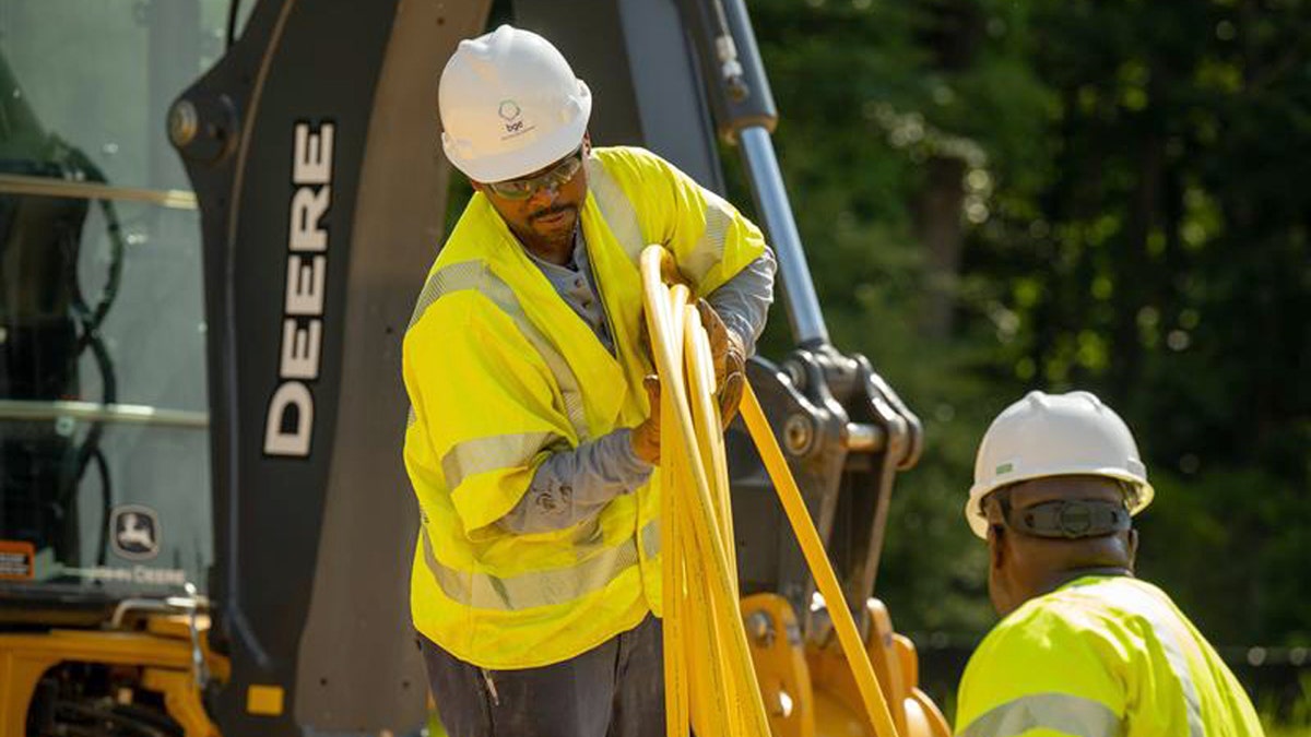 Exelon workers wearing vests and hard hats