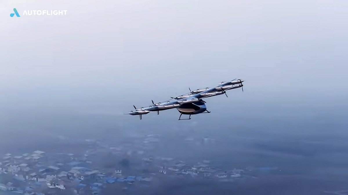 Matrix flying vehicle in the sky above a neighborhood